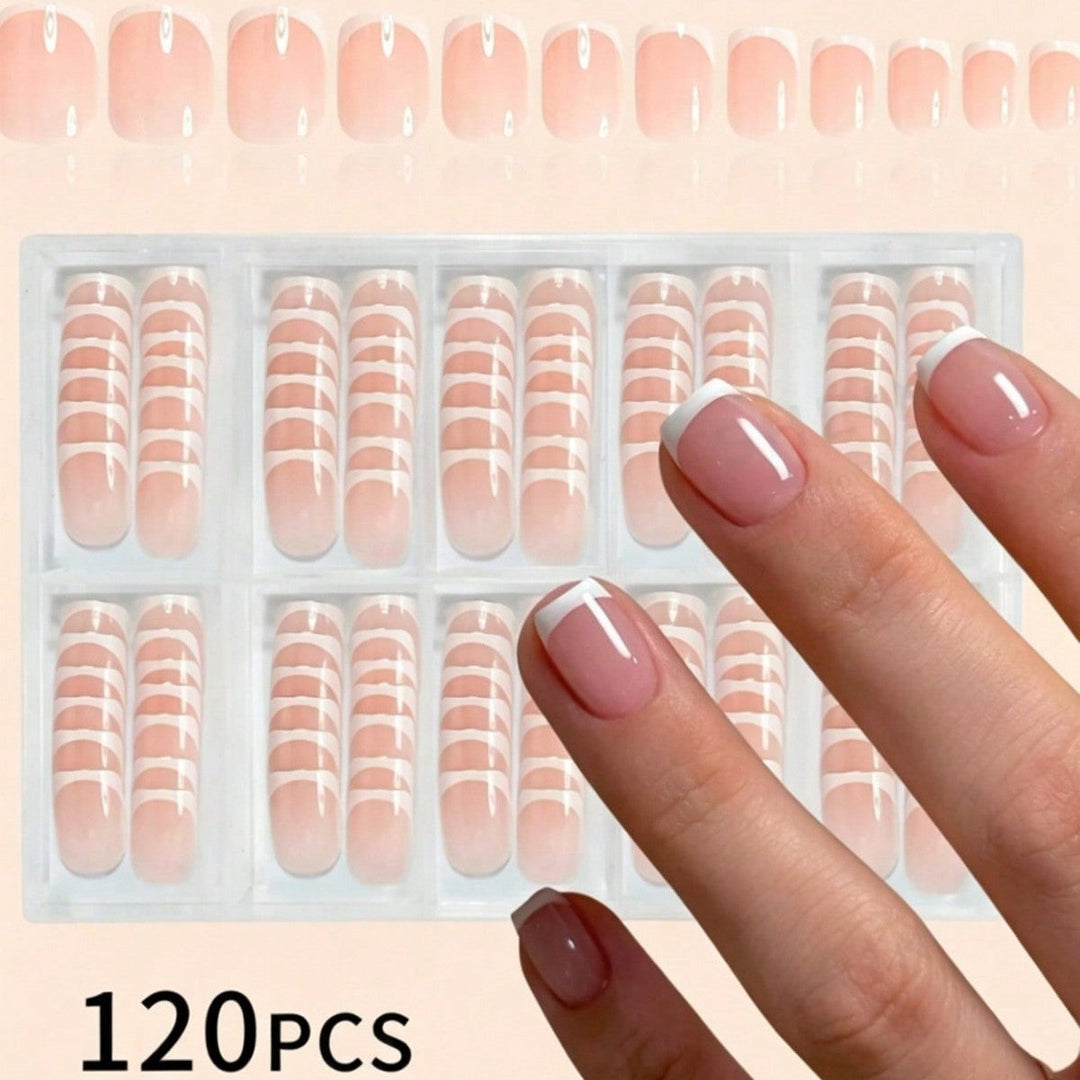 Elegant French tip press-on nails for instant, salon-quality manicures. Reusable false nails for beautiful nail art.