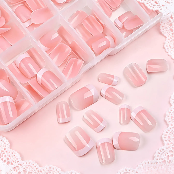 Classic white French tip press-on nails for a chic & easy at-home manicure. Durable, reusable false nail art.