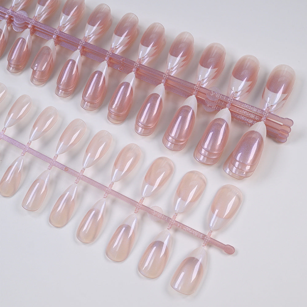 Classic white French tip press-on false nails, offering an easy, elegant at-home manicure for women.