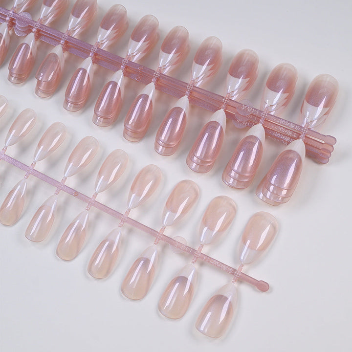 Classic white French tip press-on false nails, offering an easy, elegant at-home manicure for women.