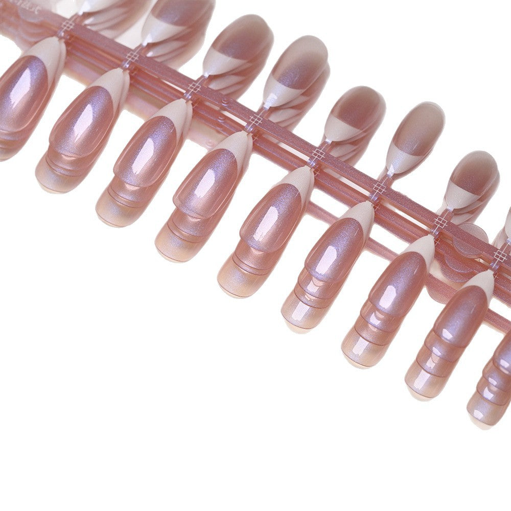 Women's DIY nail art kit featuring elegant French tip press-on nails for a quick, salon-quality look.
