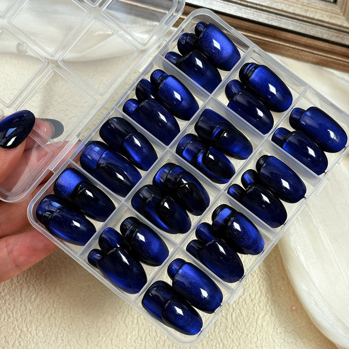 Elegant glossy women's press-on nail set. Features stiletto & oval fake nails for a quick, stylish manicure.
