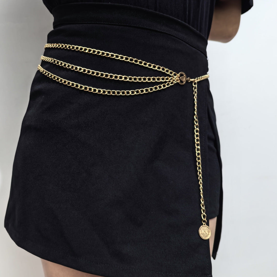 Elegant gold chain belt for women, adjustable waist accessory, perfect for dresses & outfits.
