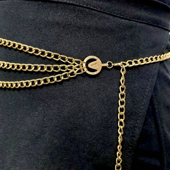 Gold chain belt for women, elegant adjustable metal waist accessory, perfect fashion statement piece.