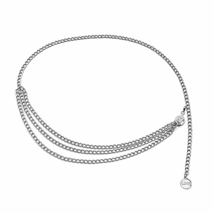 Ornate women's gold chain belt with adjustable clasp, a chic and elegant metal waist accessory.