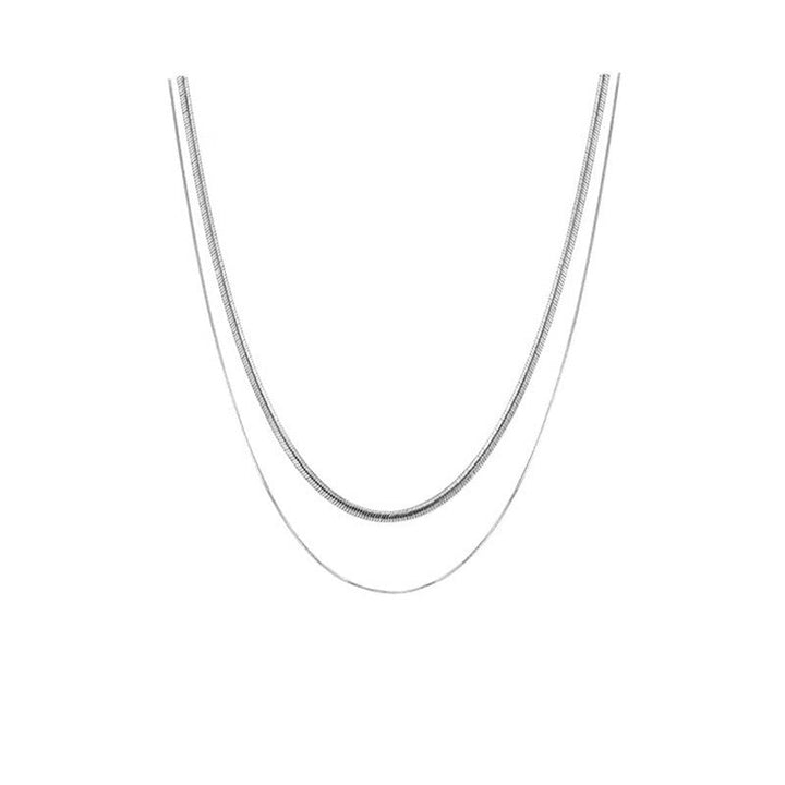 Modern gold double strand snake chain necklace, a versatile layered women's statement jewelry piece.