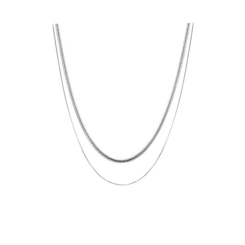 Fashionable women's double strand snake chain necklace, elegant layered gold jewelry, ideal gift for her.