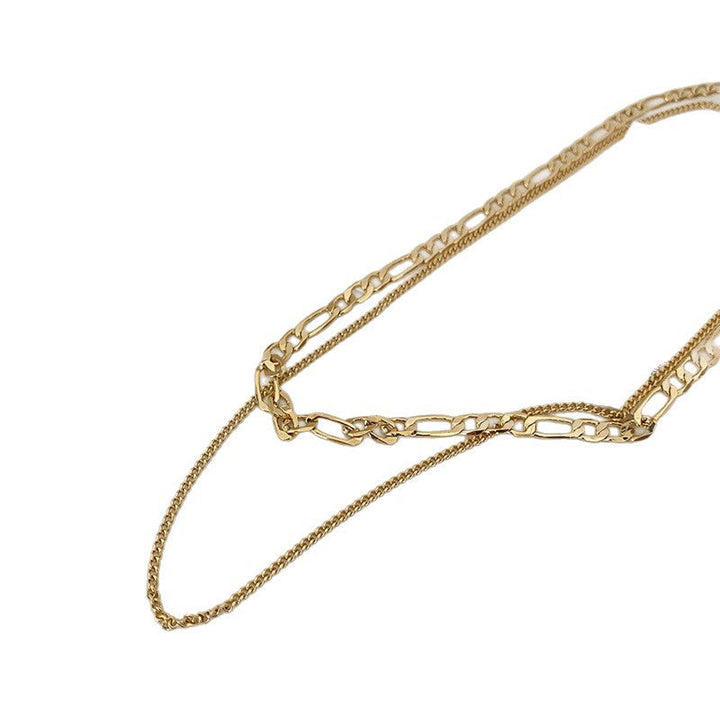 Trendy women's gold layered chain necklace, fashion jewelry to elevate any elegant outfit.