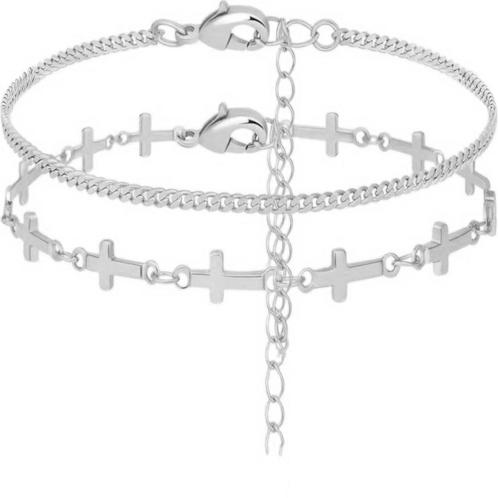 Fashionable gold layered cross charm bracelet for women. Elegant adjustable jewelry with delicate white bead accents.