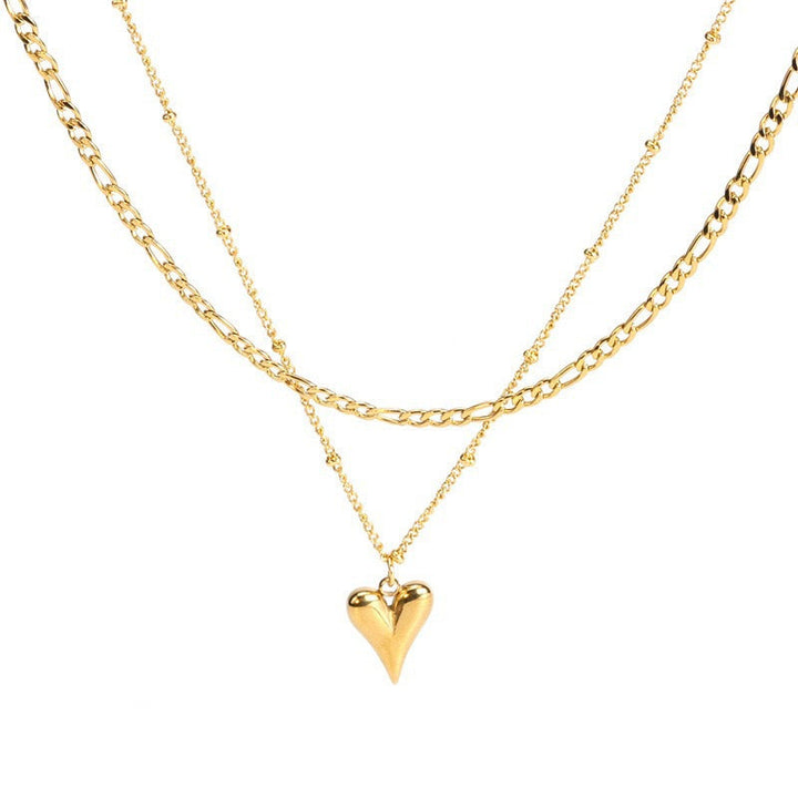 Simple yet elegant gold layered heart pendant necklace. Dainty women's accessory, perfect for any occasion.