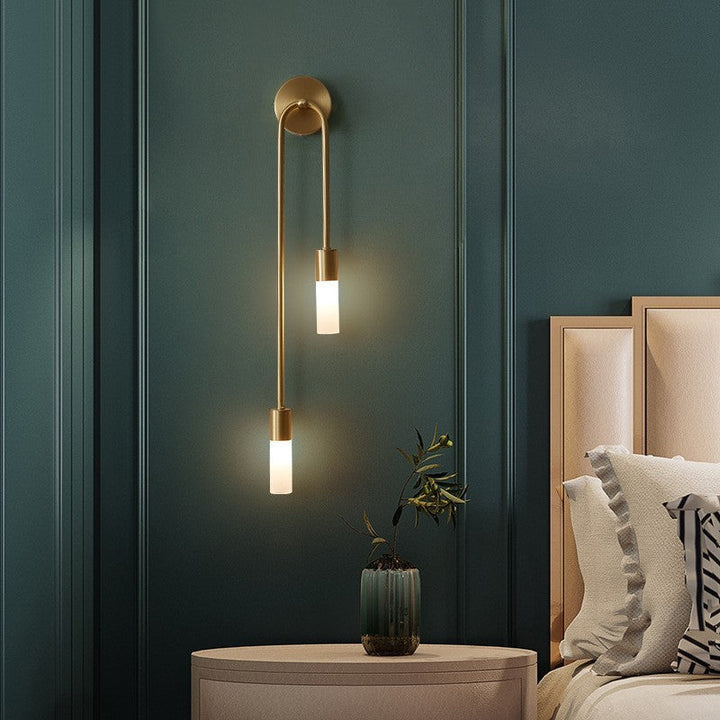 Sleek gold LED indoor wall lamp, a modern decorative fixture for stylish home lighting.