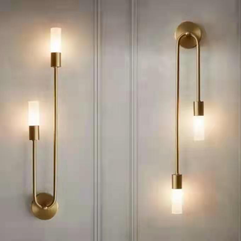 Contemporary gold LED wall accent lamp, an elegant indoor fixture for modern home decor.