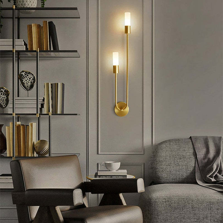 Stunning gold LED wall light fixture, elegant and modern, ideal for indoor ambient lighting.