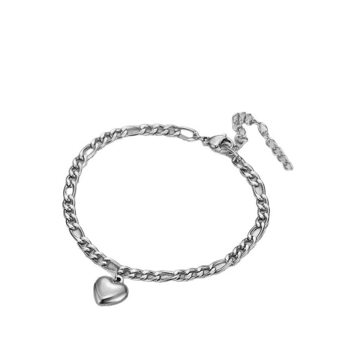 Women's adjustable gold link bracelet with a charming heart pendant. Perfect for any elegant occasion.
