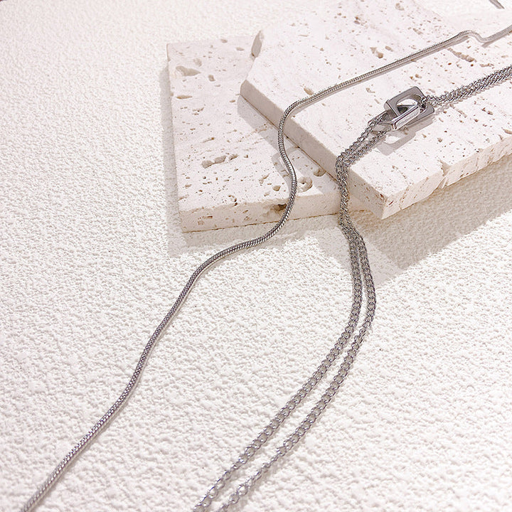 Delicate gold-tone metal glasses chain, an elegant and practical eyewear strap accessory.