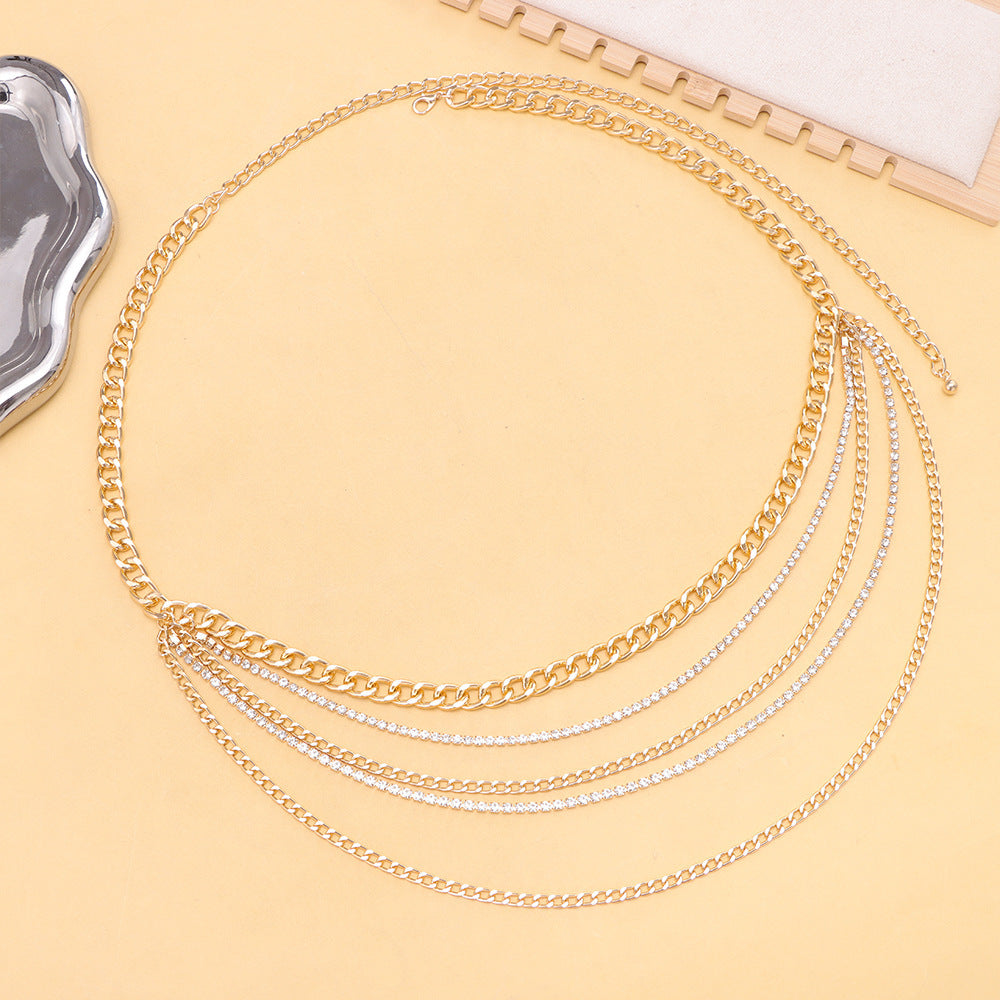Stylish adjustable multi-layered gold tone body chain, a trendy women's jewelry gift. Elegant accessory.