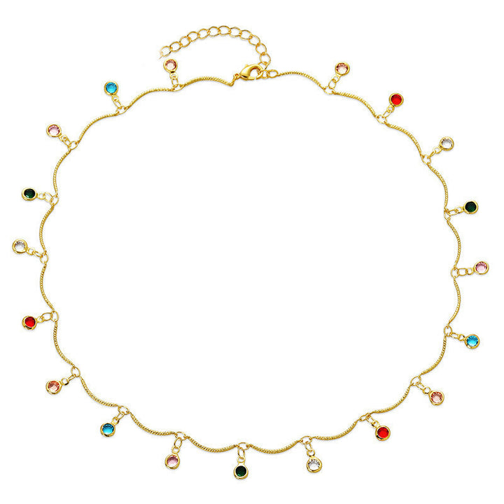 Vibrant gold-plated gemstone charm necklace, an elegant and adjustable fashion jewelry gift for women. Trendy accessory.