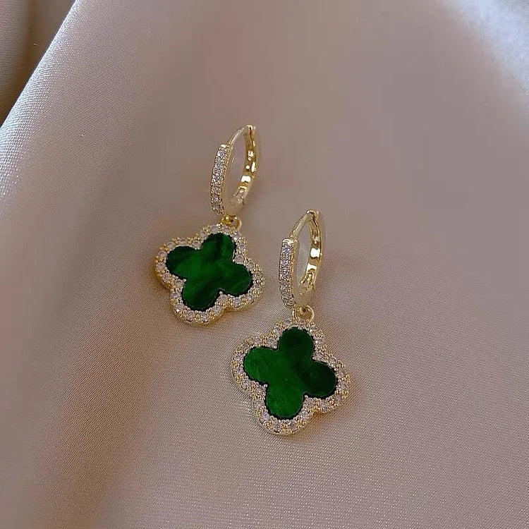 Elegant gold-plated Women's Lucky Clover Leaf Earrings with shimmering crystals, a timeless jewelry accessory.