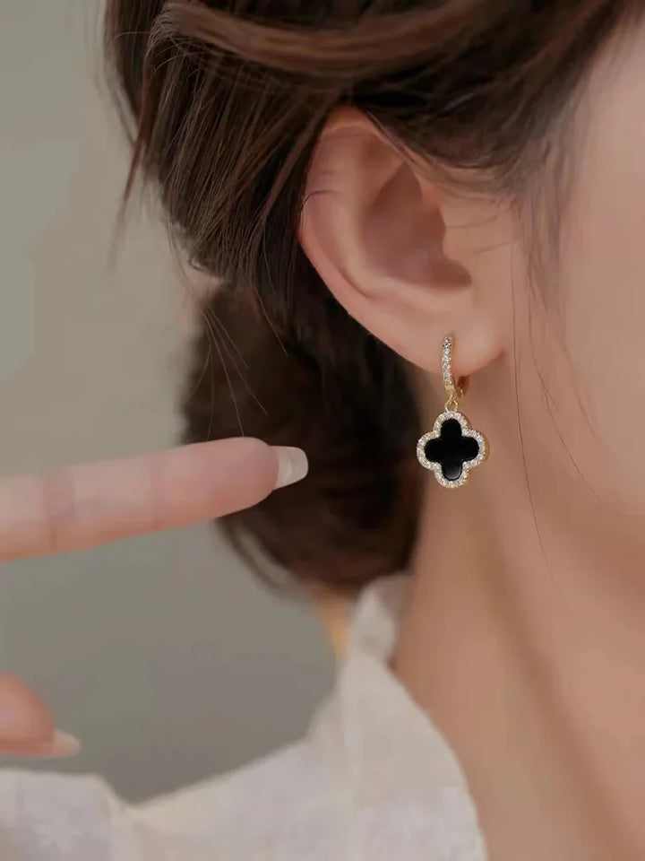 Close-up of a single Lucky Clover Leaf Earring, a sparkling crystal and gold-plated design for women.