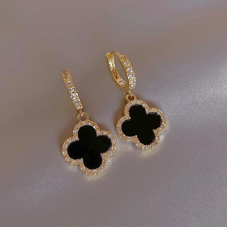 Beautiful gold-plated women's lucky clover leaf earrings, an elegant and timeless crystal jewelry accessory.