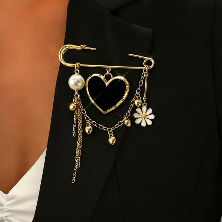 Luxurious gold safety pin necklace, an elegant women's accessory and statement piece for any outfit.