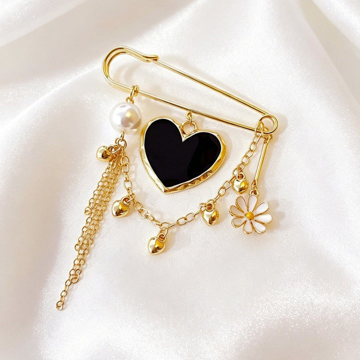 Dainty gold safety pin pendant necklace, an elegant accessory and fashion pin charm for women.