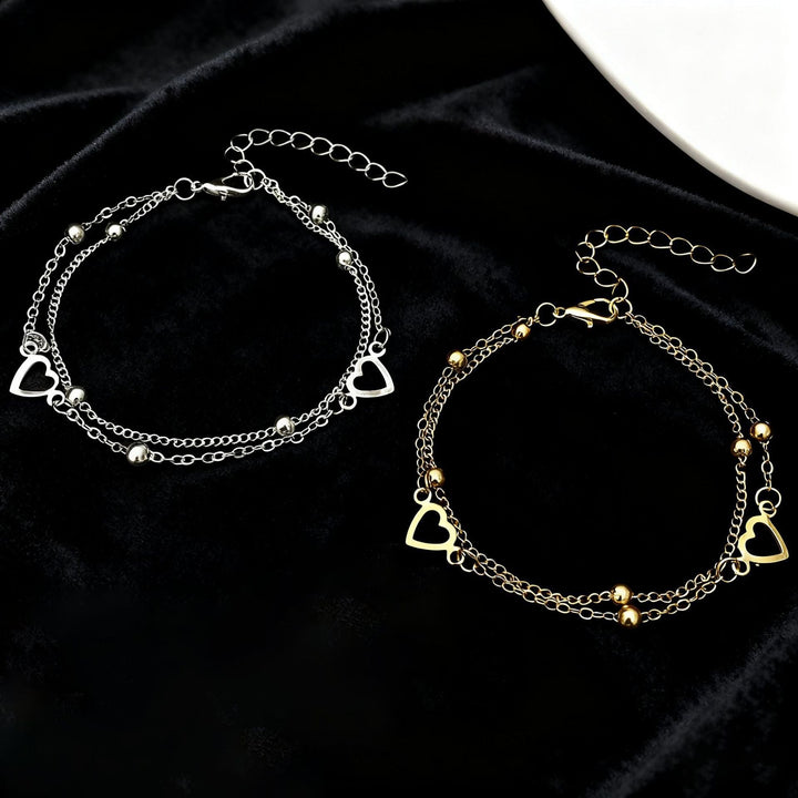 Perfect gift: Elegant gold tone layered heart charm bracelet for women. Adjustable & stylish fashion jewelry.