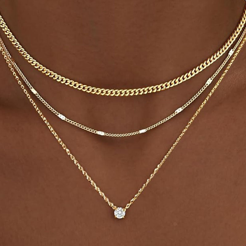 Elegant gold-tone multi-layered chain necklace for women. A stylish fashion accessory & versatile jewelry gift for her.