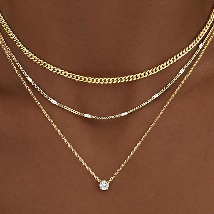 Elegant gold-tone multi-layered chain necklace for women. A stylish fashion accessory & versatile jewelry gift for her.