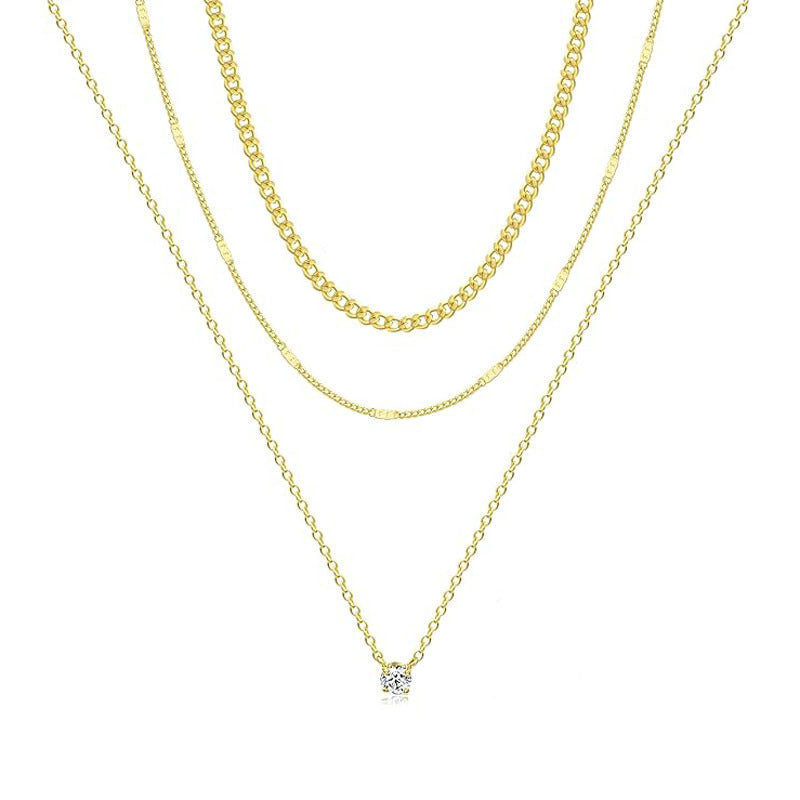Adjustable multi-layered gold chain necklace. Elegant women's jewelry, a fashionable accessory and great gift for her.