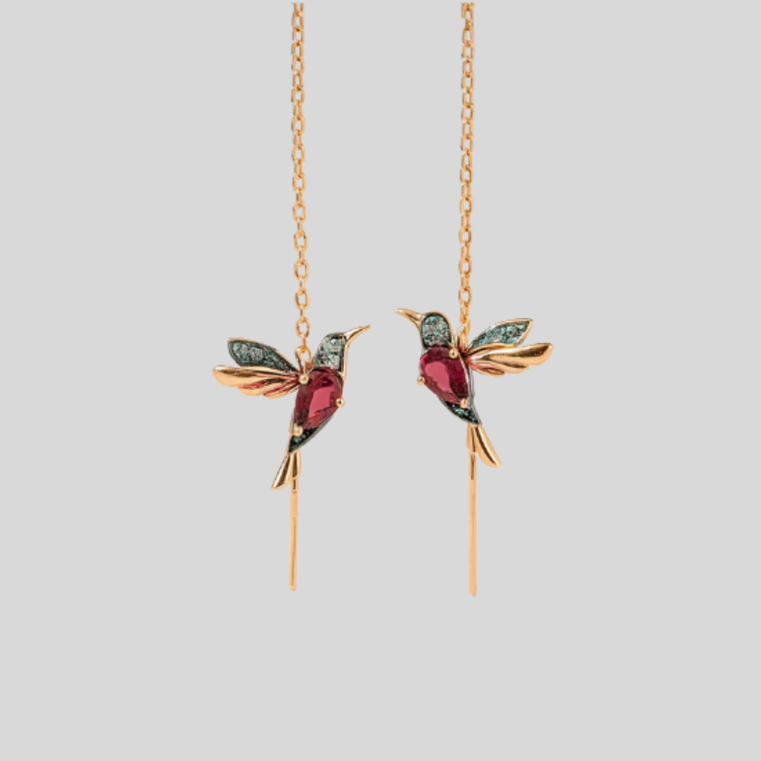 Elegant gold-tone women's hummingbird drop earrings with shimmering crystal accents. Perfect whimsical jewelry gift.