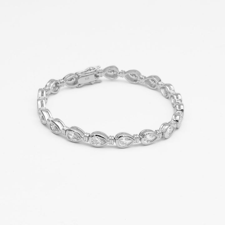 Delicate & elegant women's padel bracelet, gold vermeil & sterling silver, pear stone design. Luxury everyday wear.