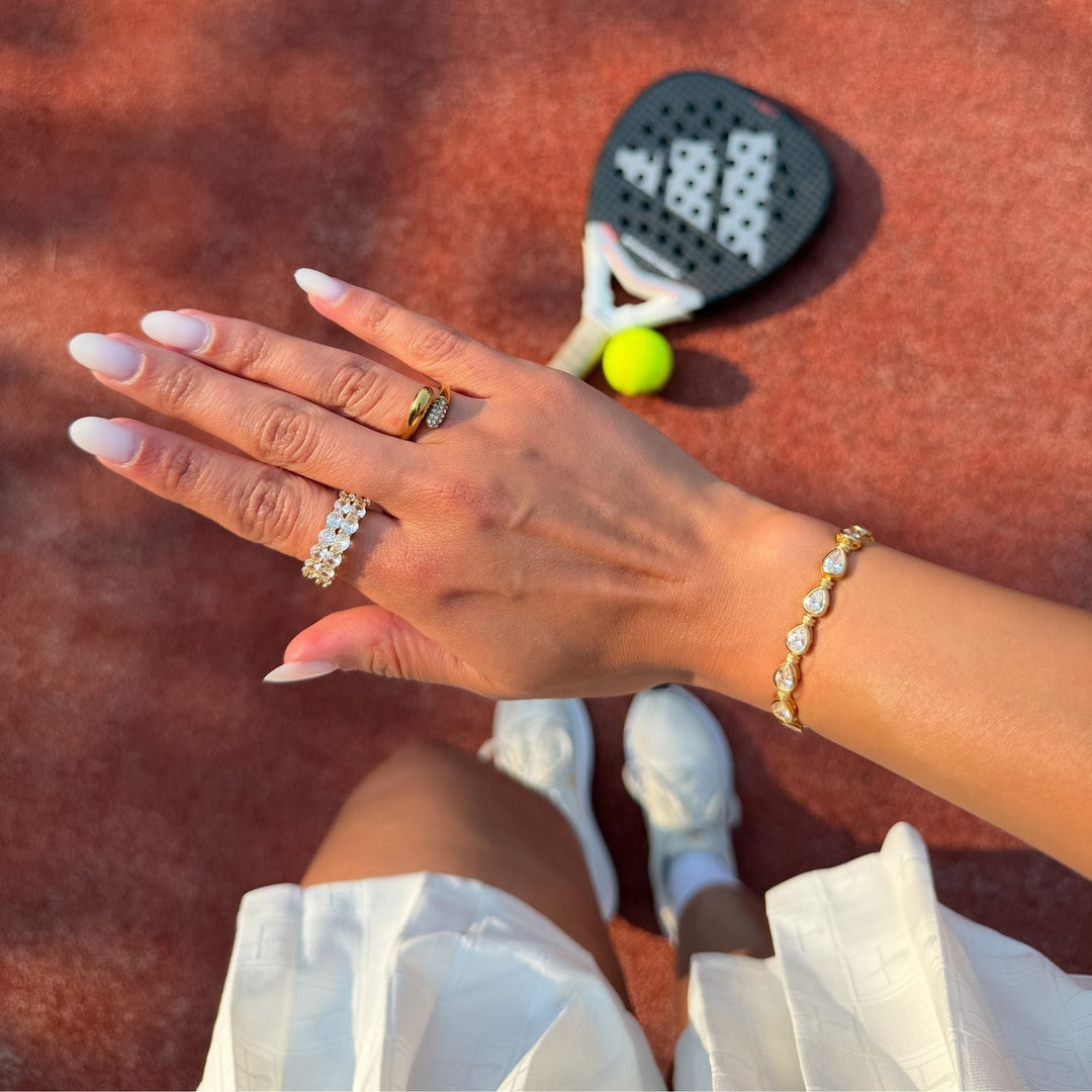 Timeless elegant women's padel bracelet, gold vermeil & sterling silver, featuring a delicate pear stone.