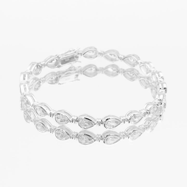 Elegant women's padel bracelet, gold vermeil & sterling silver, delicate pear stone design. Luxury everyday wear.