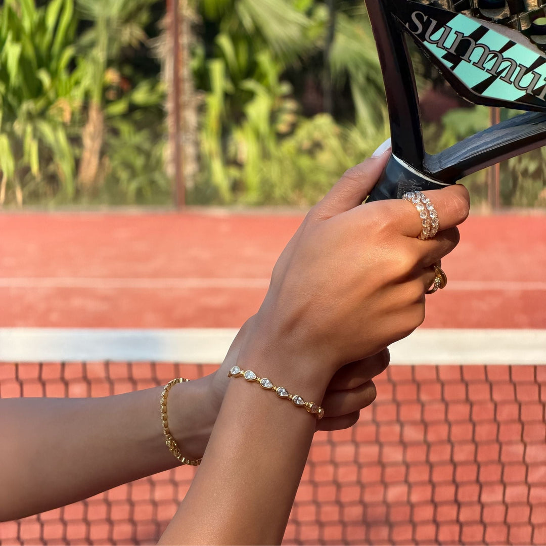 Women's elegant padel bracelet, gold vermeil & sterling silver. Delicate pear stone, stackable, everyday luxury.