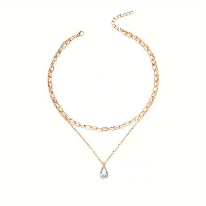Versatile women's elegant layered link necklace, gold & white, perfect for daily wear or events.