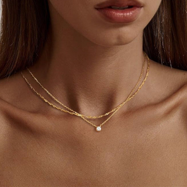 Beautiful women's elegant layered necklace in gold with white plating, a stunning and delicate gift for her.