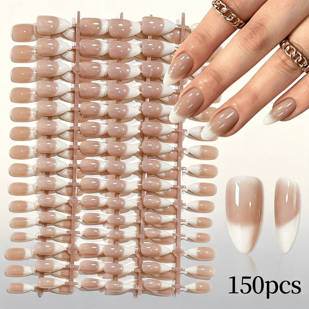 Women's stylish false nails with a subtle gradient French tip design, ideal for nail art.