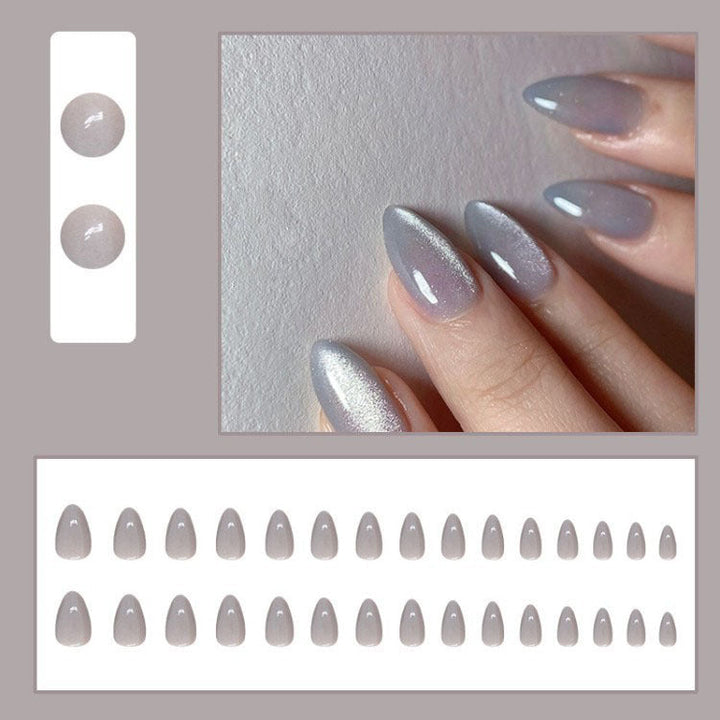 Chic gray stiletto artificial nail tips, offering a sophisticated and elegant look for women's beauty.