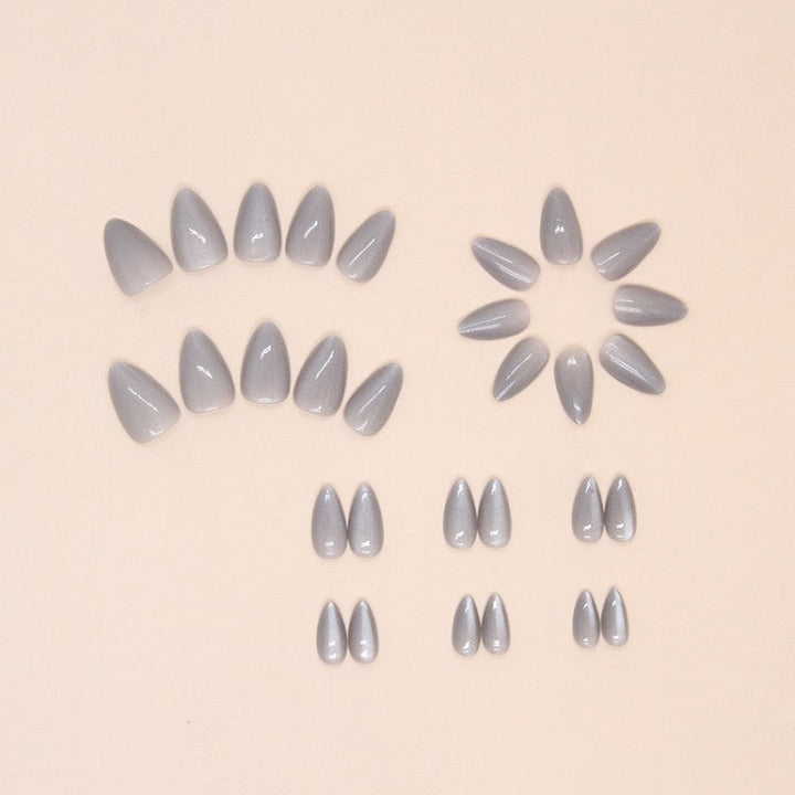 Fashionable women's gray stiletto false nails for an easy, instant elegant manicure and stylish nail art.