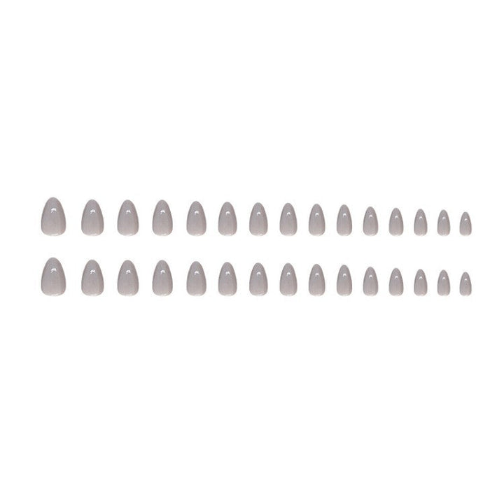Women's sophisticated gray stiletto press-on nail tips for elegant instant manicures & artificial nail art.