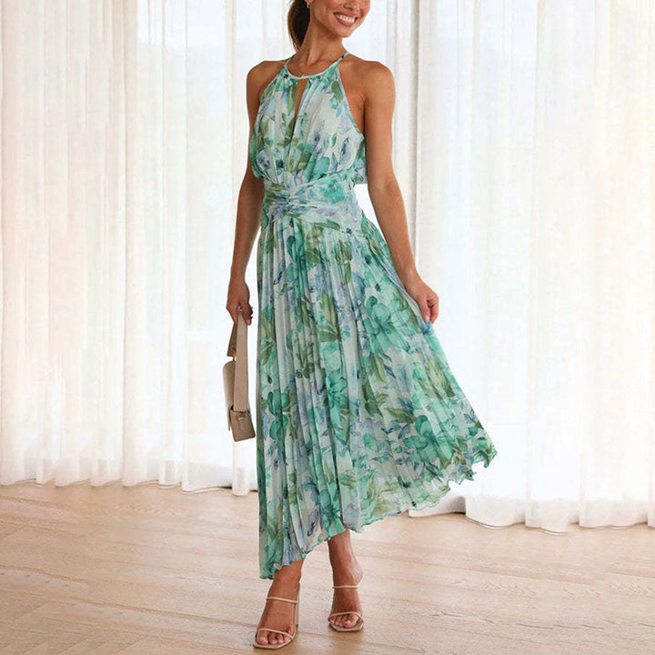 Elegant green floral maxi dress for women, perfect for summer vacations & beach parties. Flowy & comfortable.