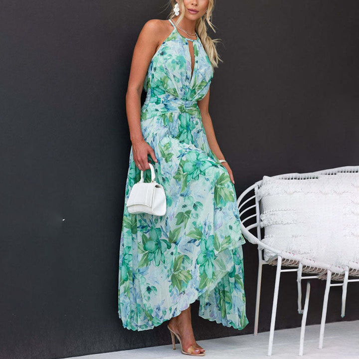 Chic women's floral maxi dress with a halter neck. Ideal for summer breezes, beach, vacation & party wear.