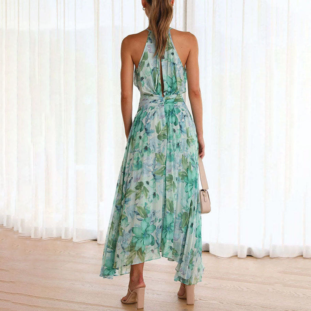 Comfortable flowy green floral maxi dress for women. Elegant summer party dress with a beautiful print.