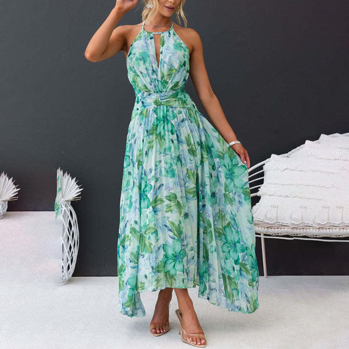 Breathable green floral maxi dress for women. Elegant & flowy summer attire, ideal for vacation or party.