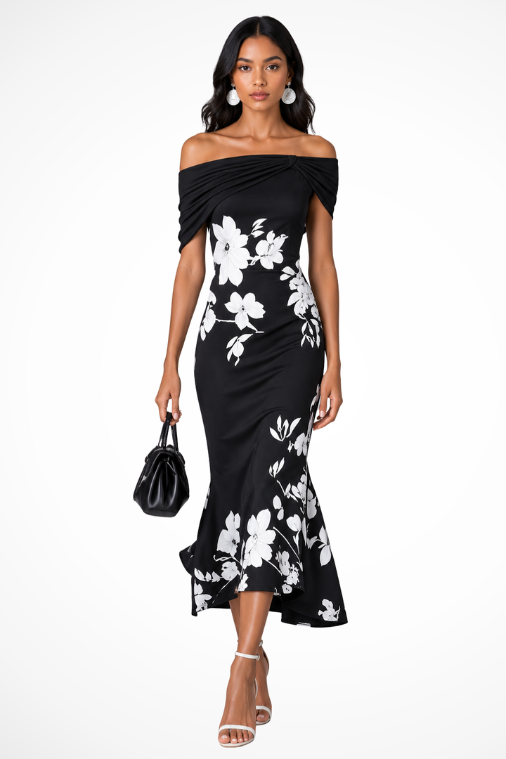 Stylish black off-shoulder midi dress with vibrant floral print. An elegant party or wedding guest dress for women.