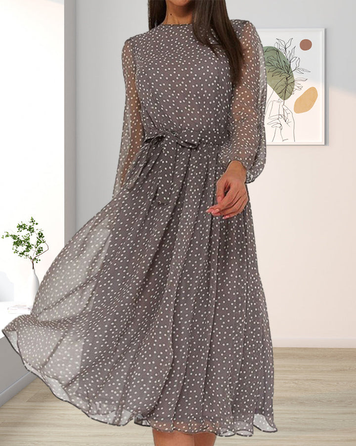Versatile women's grey polka dot A-line dress, knee-length and long-sleeved, offering elegant comfort for any occasion.