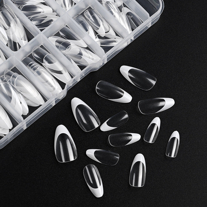 Women's elegant blue half-moon French tip press-on nails, easy DIY fake nails for a quick, chic manicure.