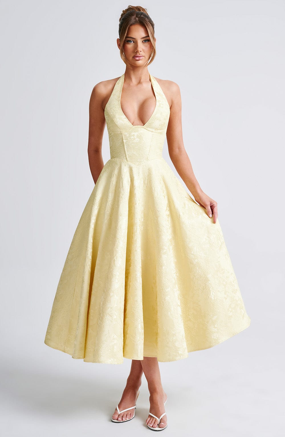 Flattering formal halter midi dress for women, ideal for summer weddings & upscale events.
