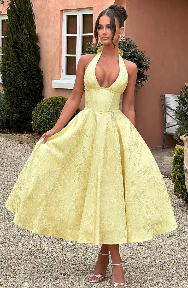 Perfect special occasion dress: an elegant halter midi for wedding guests & formal wear.